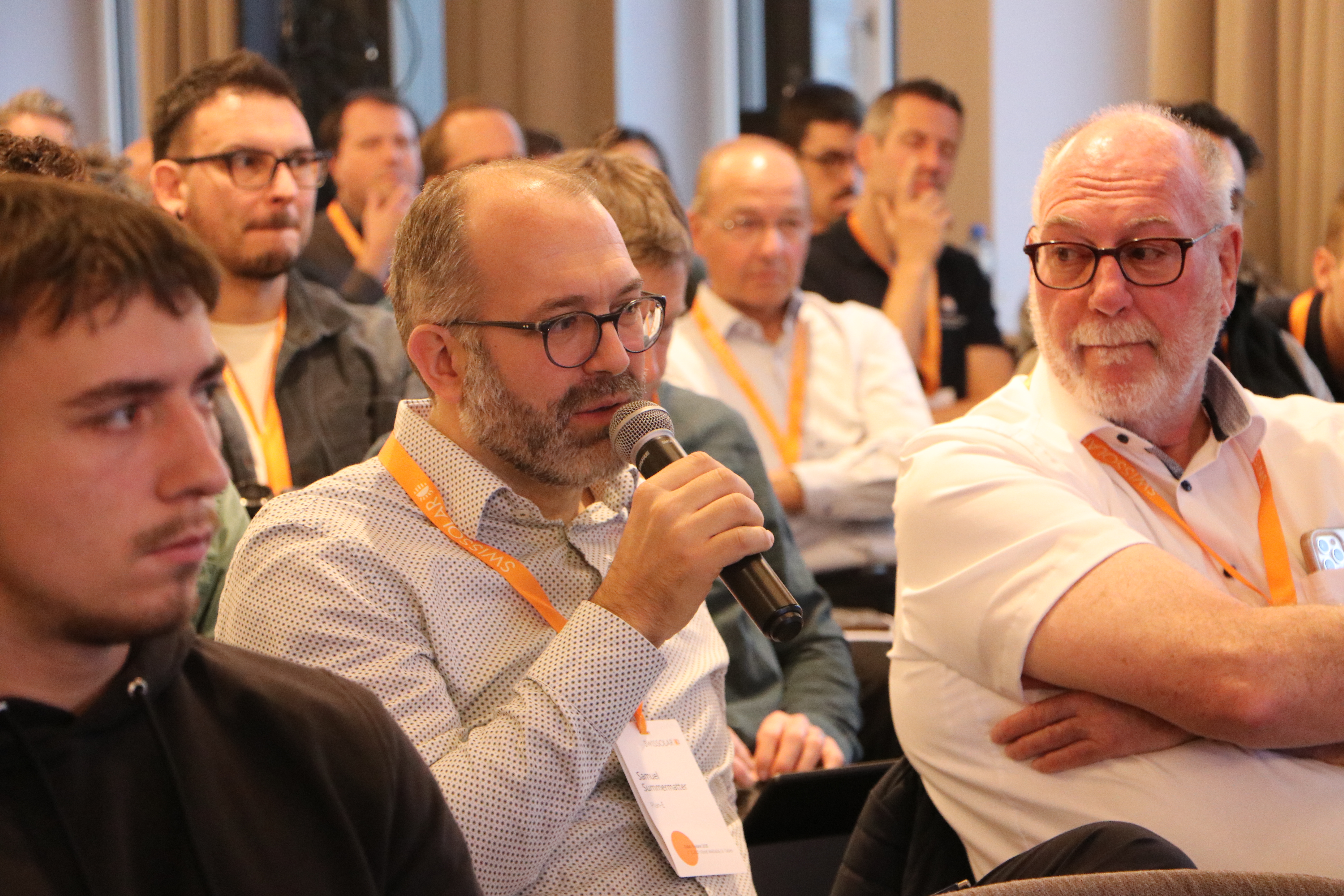 Person auf einem Event | © Swissolar